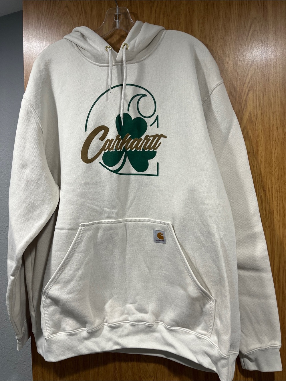 Carhartt Men’s Cream Crewneck Hoodie with Green Clover & Gold Script